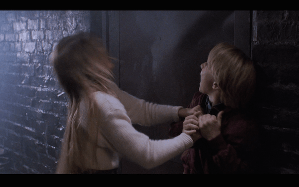 The Blob is so scary that this kid accidentally Birdman'd himself to the door.