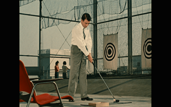 Notice the foreground red and white matching the background girls dressed in red and white.