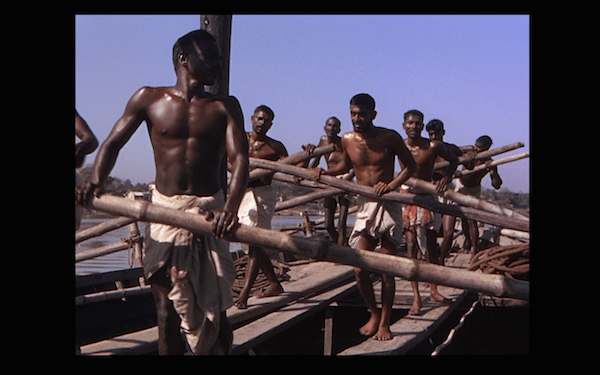 the river men on boats