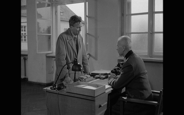 the bridge - teacher standing up to commander